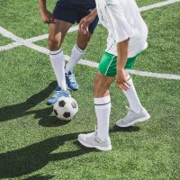 partial-view-of-athletic-soccer-players-playing-so-2021-08-29-11-44-26-utc-1.jpg
